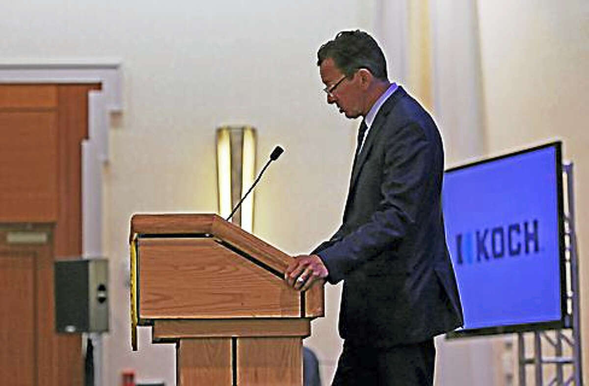 Gov. Dannel P. Malloy introduces Valerie Jarrett Wednesday at the “Reimagining Justice” conference.