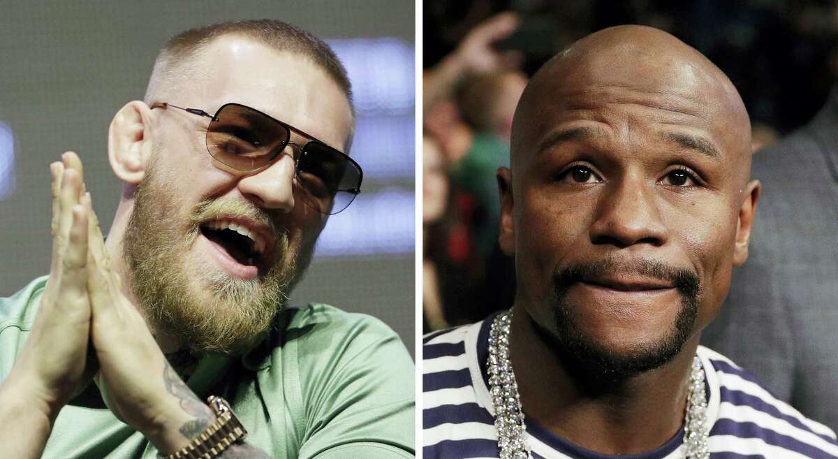 Conor McGregor, left, and Floyd Mayweather Jr. will face off on Aug. 26.
