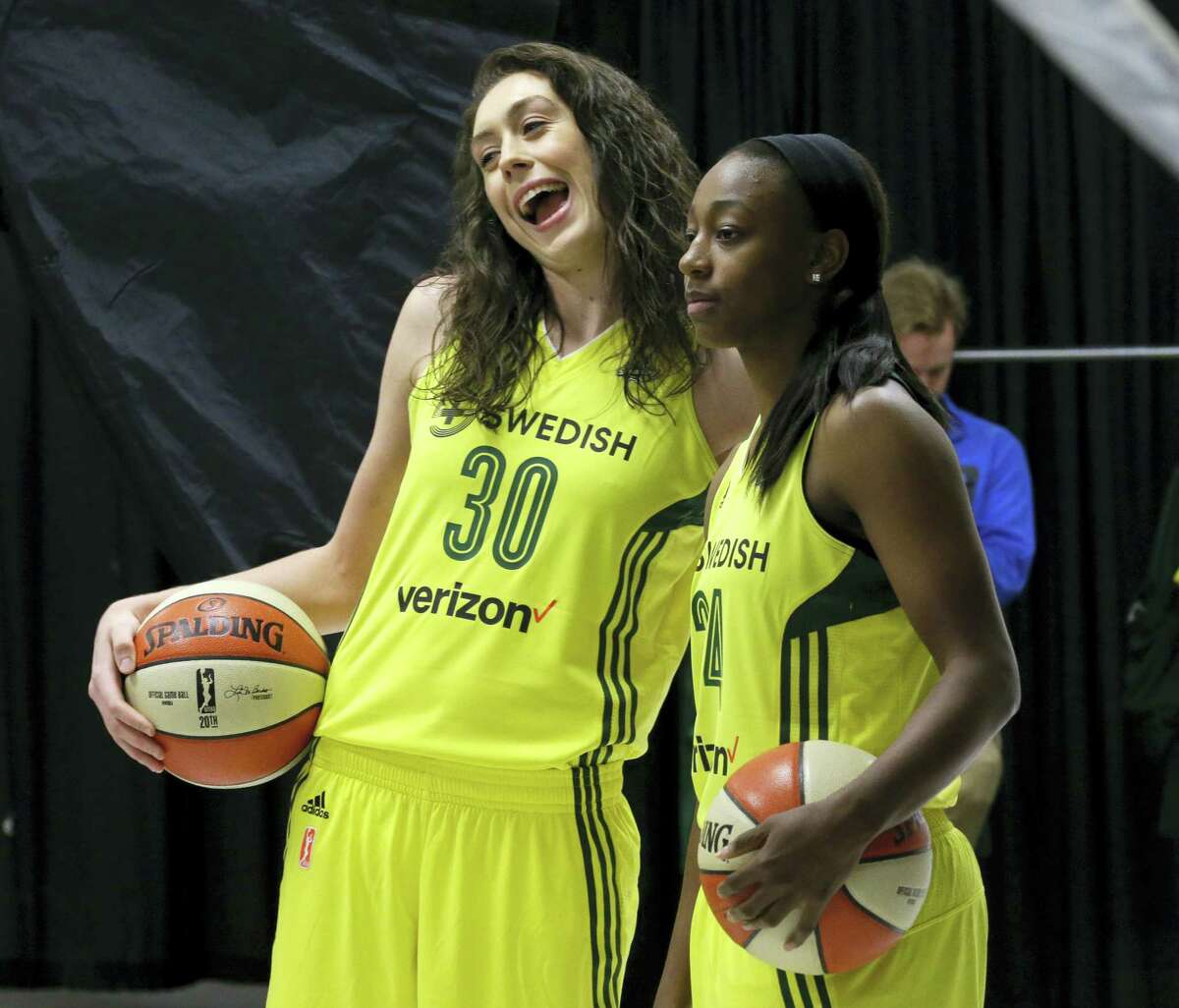 Seattle Storm forward Breanna Stewart, left, and guard Jewell Loyd pose for photos during the Seattle Storm’s annual media day last week. After a much needed break, Stewart is ready for her second season with the Seattle Storm.
