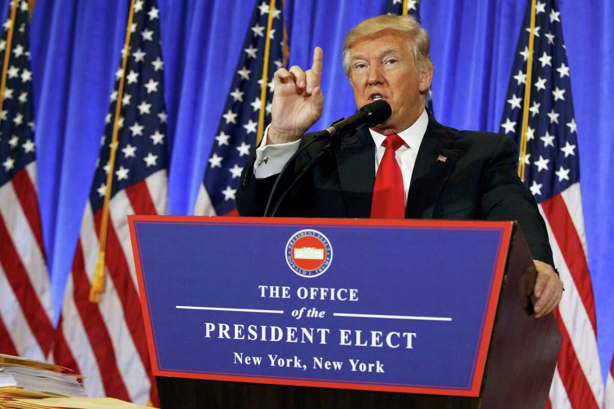 President-elect Donald Trump speaks during a news conference in the lobby of Trump Tower in New York Wednesday.