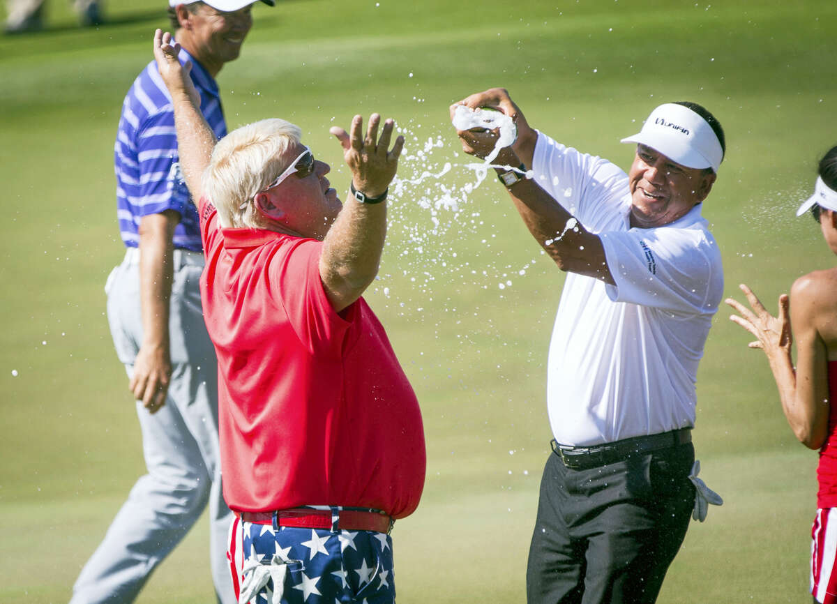 John Daly is doused after winning the Insperity Invitational golf tournament on May 7, 2017 in The Woodlands, Texas.