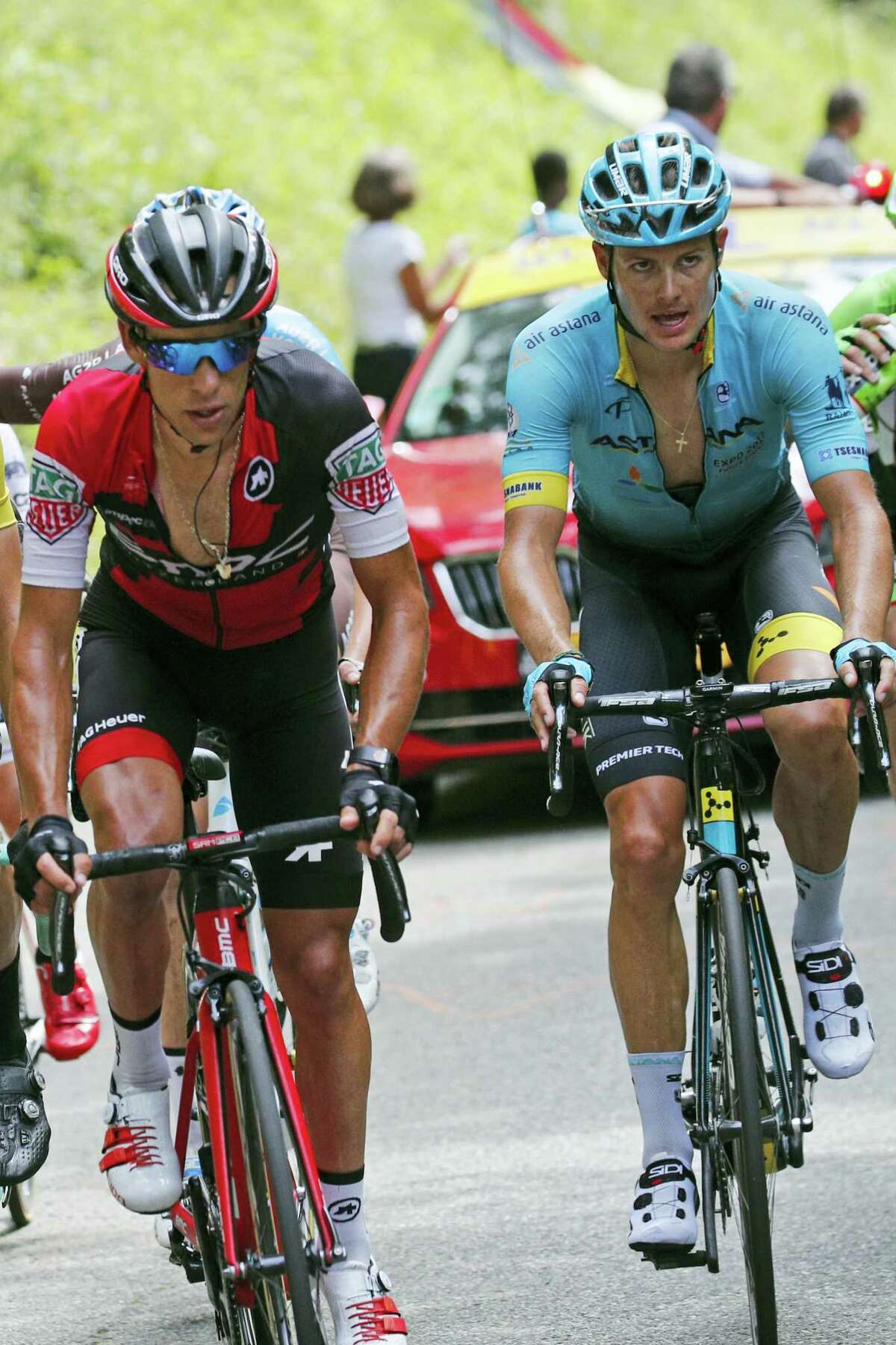 Australia’s Richie Porte, left, and Denmark’s Jakob Fuglsang, climb Mont du Chat pass during the ninth stage of the Tour de France cycling race over 181.5 kilometers (112.8 miles) with start in Nantua and finish in Chambery, France on July 9, 2017.