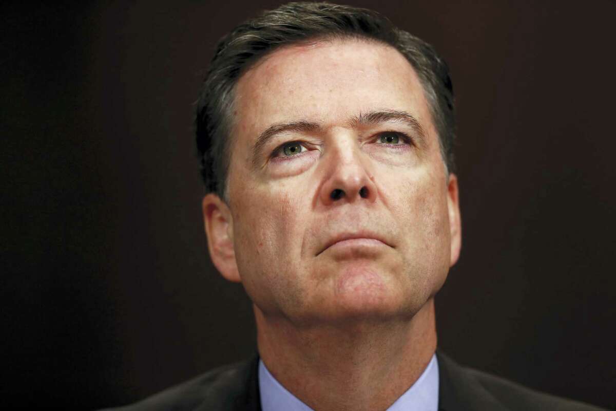 In this May 3, 2017, file photo, FBI Director James Comey listens on Capitol Hill in Washington. President Donald Trump has fired Comey. In a statement on Tuesday, May 9, Trump says Comey’Äôs firing ‘Äúwill mark a new beginning’Äù for the FBI.