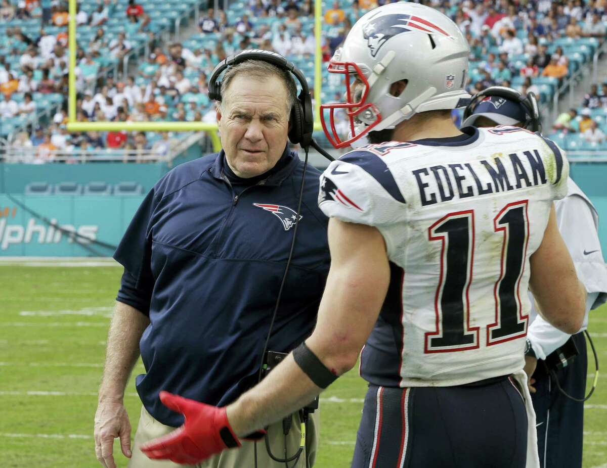 Brady throws for 3 scores to help Pats beat Miami 35-14