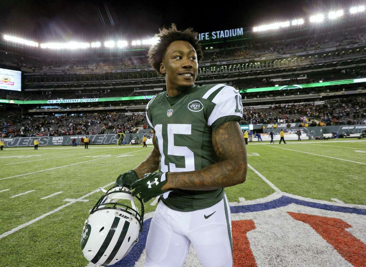 In this Nov. 27, 2016 photo, New York Jets wide receiver Brandon Marshall walks off the field after the team’s NFL football game against the New England Patriots in East Rutherford, N.J.