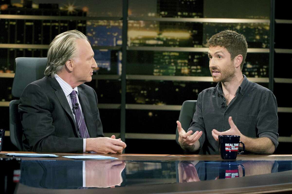 In this photo provided by HBO, Bill Maher, left, speaks with Sen. Ben Sasse of Nebraska during a segment of his “Real Time with Bill Maher,” Friday, June 2, 2017. Maher is facing criticism for his use of a racial slur during a discussion with the Republican senator on his HBO talk show Friday night.