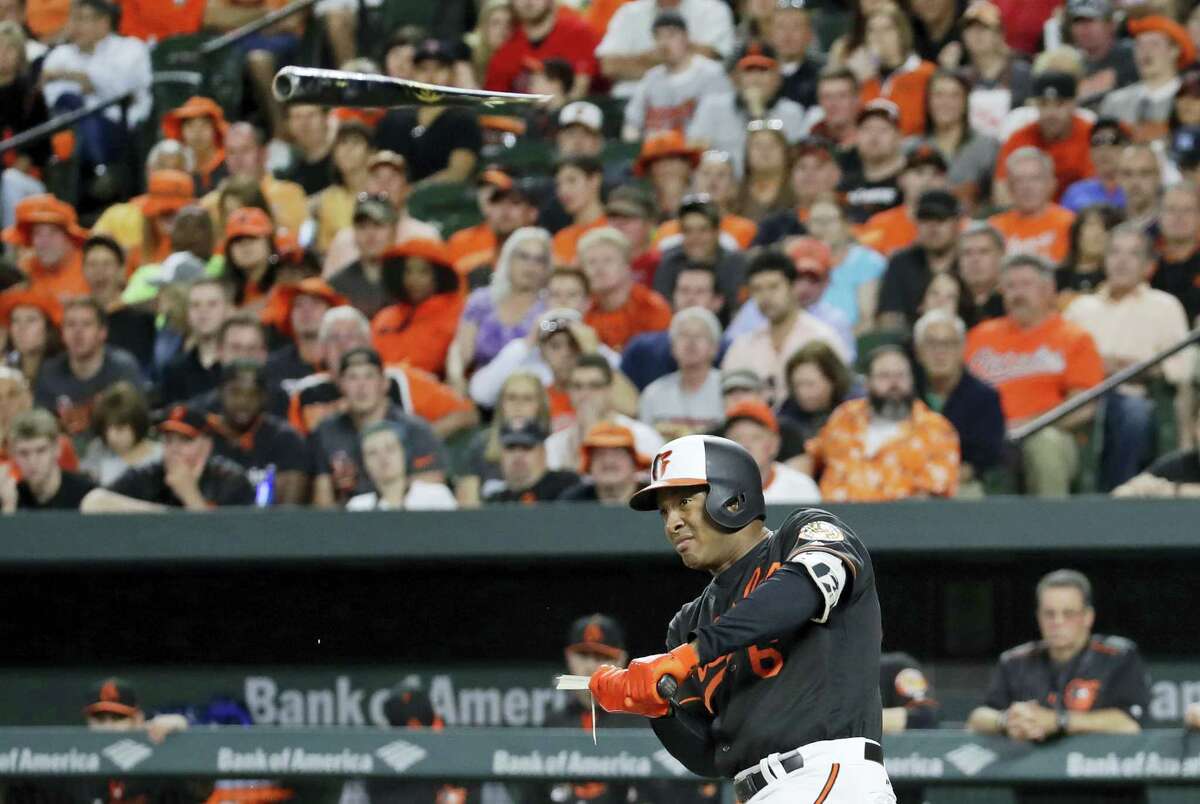 Baltimore Orioles’ Jonathan Schoop breaks his bat as he singles in the sixth inning of a baseball game against the Boston Red Sox in Baltimore, Friday, June 2, 2017. (AP Photo/Patrick Semansky)