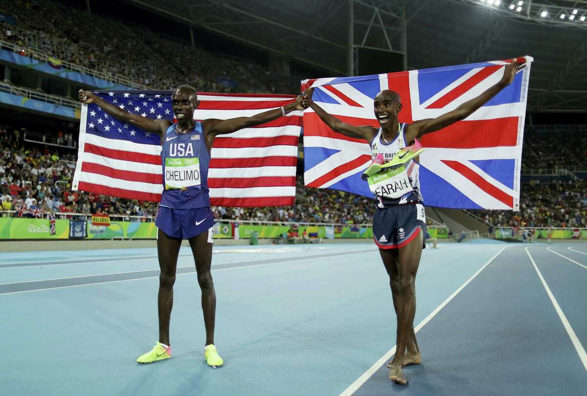 This is an Aug. 20, 2016 photo of Britain’s gold medal winner Mo Farah, right, as he celebrates with United States’ Paul Kipkemoi Chelimo, silver medalist, after the 5,000 metres at the 2016 Summer Olympics in the Olympic stadium in Rio de Janeiro, Brazil. American and British Olympic leaders will firm up plans for a multisport event between the countries at a meeting in New York in March 2017.