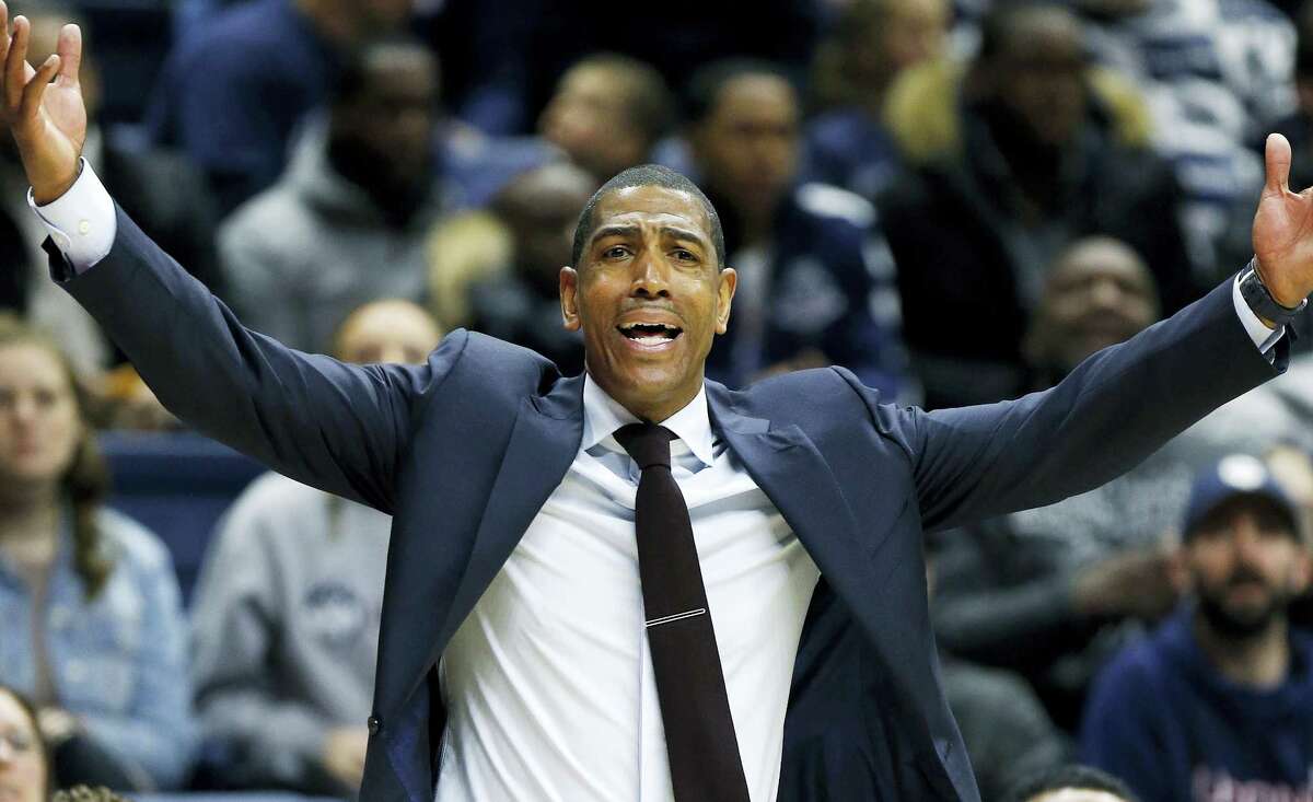 UConn head coach Kevin Ollie reacts during the first half Sunday’s game against Cincinnati in Storrs.