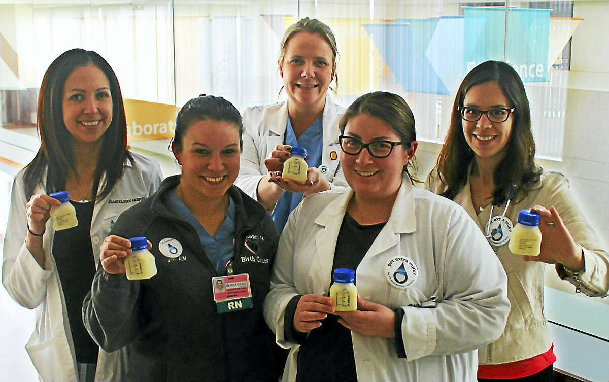 Through a grant from the Peach Pit Foundation of Durham, Middlesex Hospital in Middletown now offers pasteurized donor breast milk to breastfed babies whose nursing mothers need supplementation. From left are Laura Pittari, lead neonatal nurse practitioner; Jen Cote, registered nurse; Sarah Lennon, assistant nurse manager; and Brianna McNally, a lactation consultant; all of whom work at the Pregnancy & Birth Center; and pediatrician Lauren Melman.