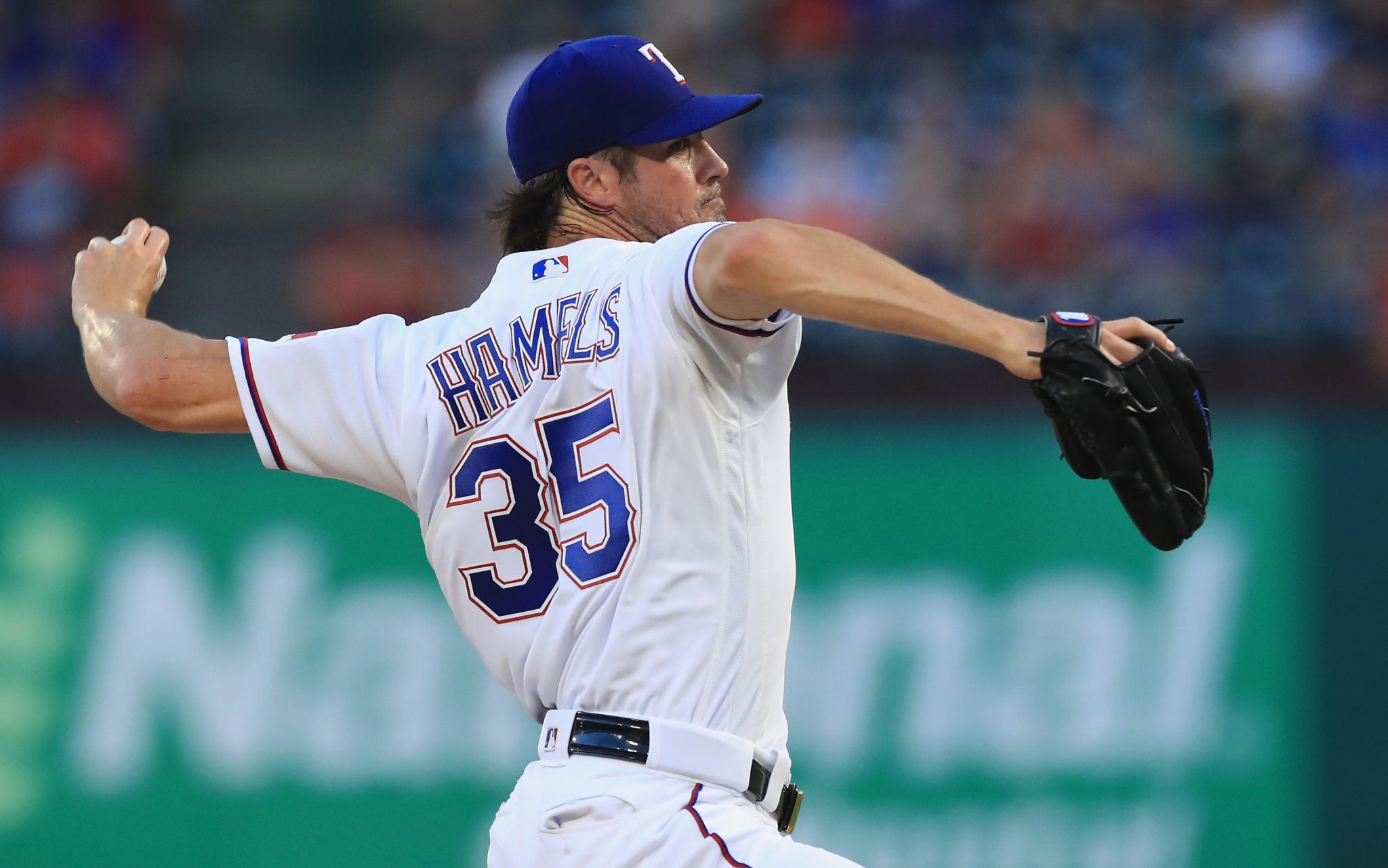 Pitcher Cole Hamels #35 of the Texas Rangers watches the New York