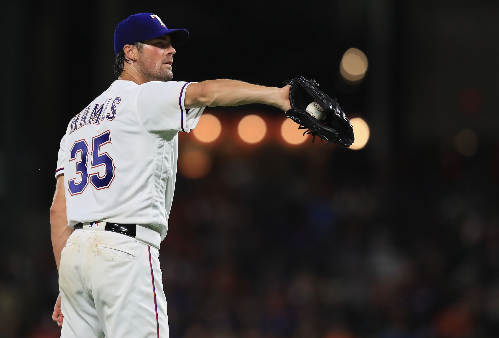 Pitcher Cole Hamels #35 of the Texas Rangers watches the New York