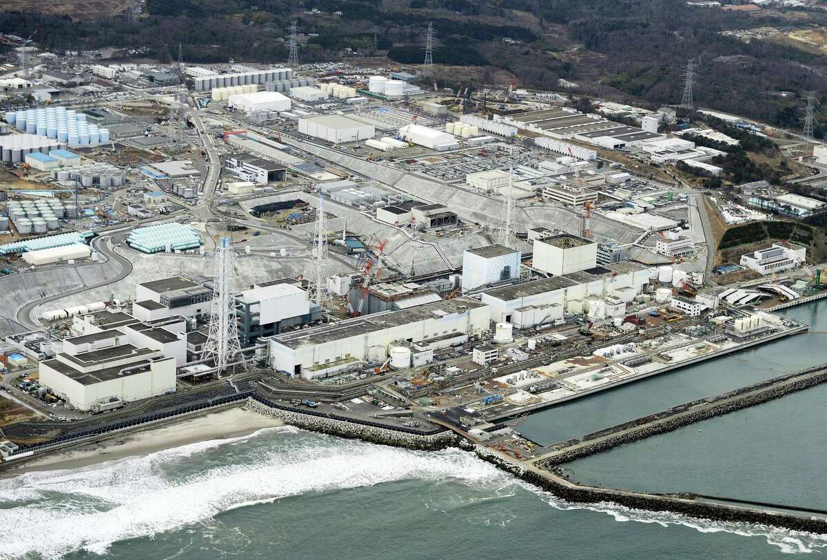 This March 11, 2016, photo shows the crippled Fukushima Dai-ichi nuclear plant in Okuma town, Fukushima prefecture, northeastern Japan. The operator of Japan’s destroyed Fukushima nuclear plant switched on a giant refrigeration system on Thursday, March 31, to create an unprecedented underground ice wall around its damaged reactors. Radioactive water has been flowing from the reactors, and other methods have failed to fully control it. The decontamination and decommissioning of the plant, damaged by a massive earthquake and tsunami in 2011, hinge of the success of the wall.