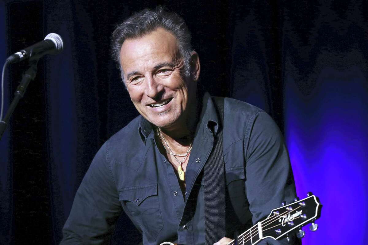 In this Nov. 10, 2015, file photo, Bruce Springsteen performs at the 9th Annual Stand Up For Heroes event in New York. A Philadelphia fifth-grader ditched school for the chance to meet the rock legend at his book signing Thursday, Sept. 30, 2016, and The Philadelphia Inquirer reports ”The Boss” gladly played along by signing the boy’s absence excuse note.