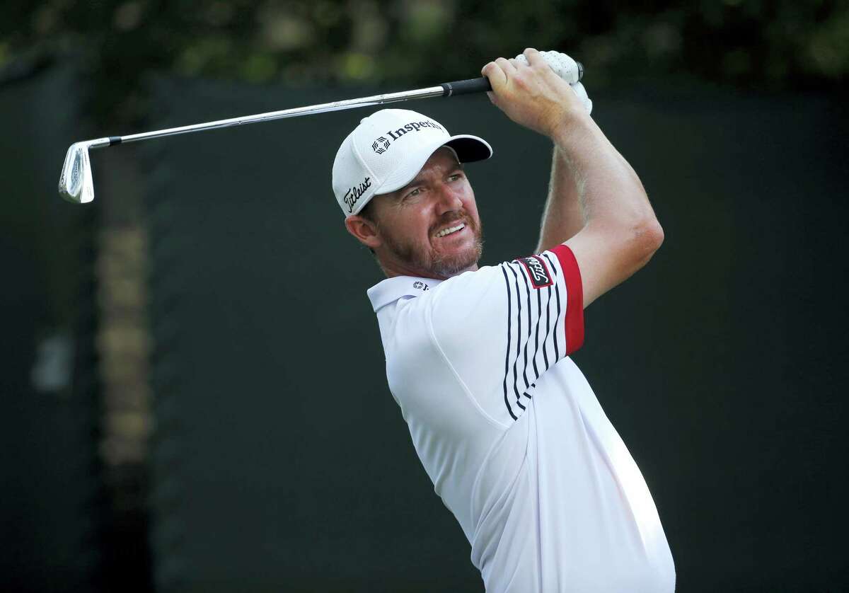 Jimmy Walker watches his tee shot on the 16th hole during the second round of the PGA Championship golf tournament at Baltusrol Golf Club in Springfield, N.J., Friday.