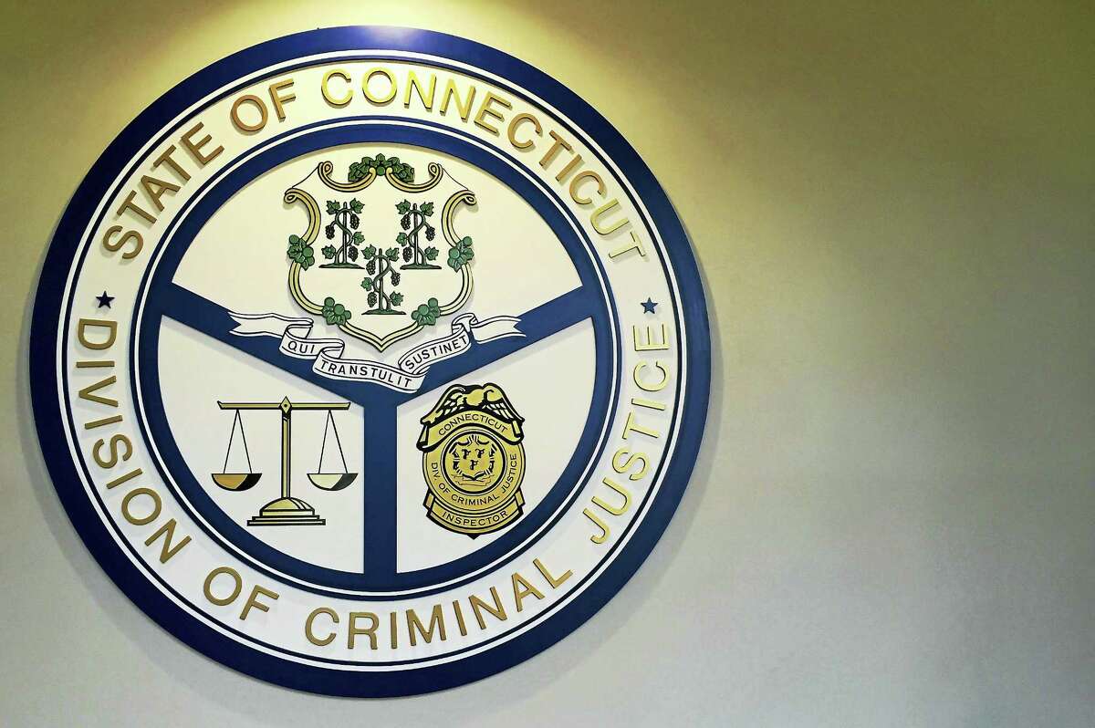The seal for the state’s Division of Criminal Justice inside the lobby of its offices in Rocky Hill. The offices also house the state’s Cold Case Bureau.