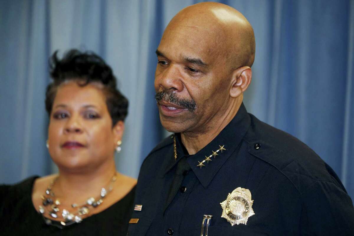 Denver Police Chief Robert White, front, talks while Stephanie O’Malley, manager of safety, looks on about a shooting and stabbing incident at a motorcycle expo during a news conference Saturday, Jan. 30, 2016, in Denver. Police say that multiple people were injured in the incident, which took place at The Colorado Motorcycle Expo.