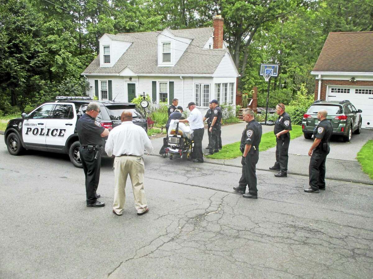 At least eight Middletown police officers, including two captains, responded to a crash Friday morning in which the driver of a sedan fled the scene but was soon taken into custody.
