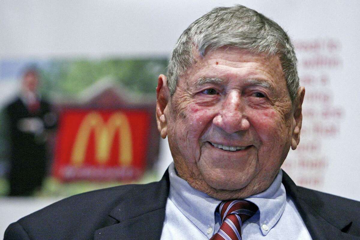In this file photo, Big Mac creator Michael “Jim” Delligatti attends his 90th birthday party in Canonsburg, Pa. Delligatti, the Pittsburgh-area McDonald’s franchisee who created the Big Mac in 1967, has died. He was 98.