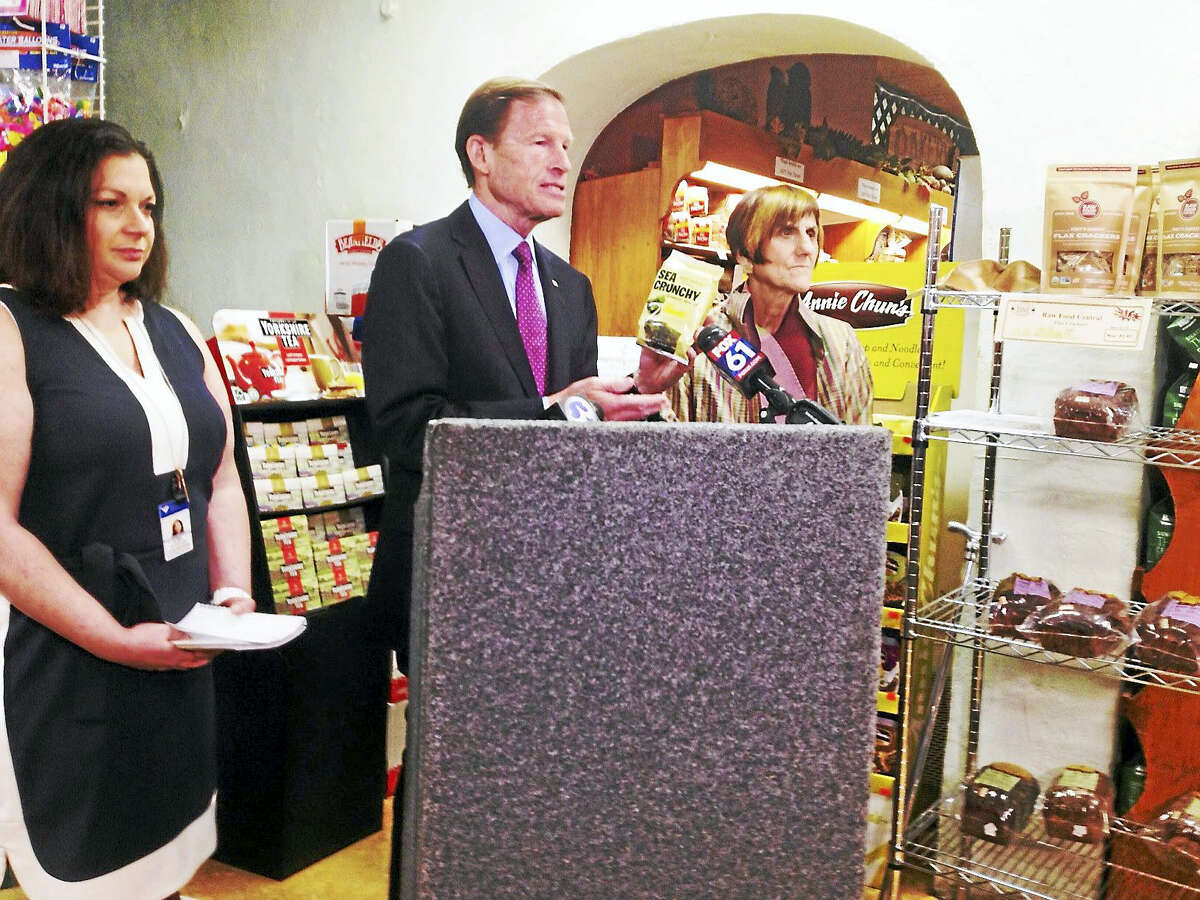 From left, dietitian Ilisa Nussbaum, U.S. Sen. Richard Blumenthal and U. S. Rep. Rosa DeLauro talk about food labeling at Edge of the Woods and the need for the FDA to define the word “natural.” They praised Edge of the Woods for vetting natural products.
