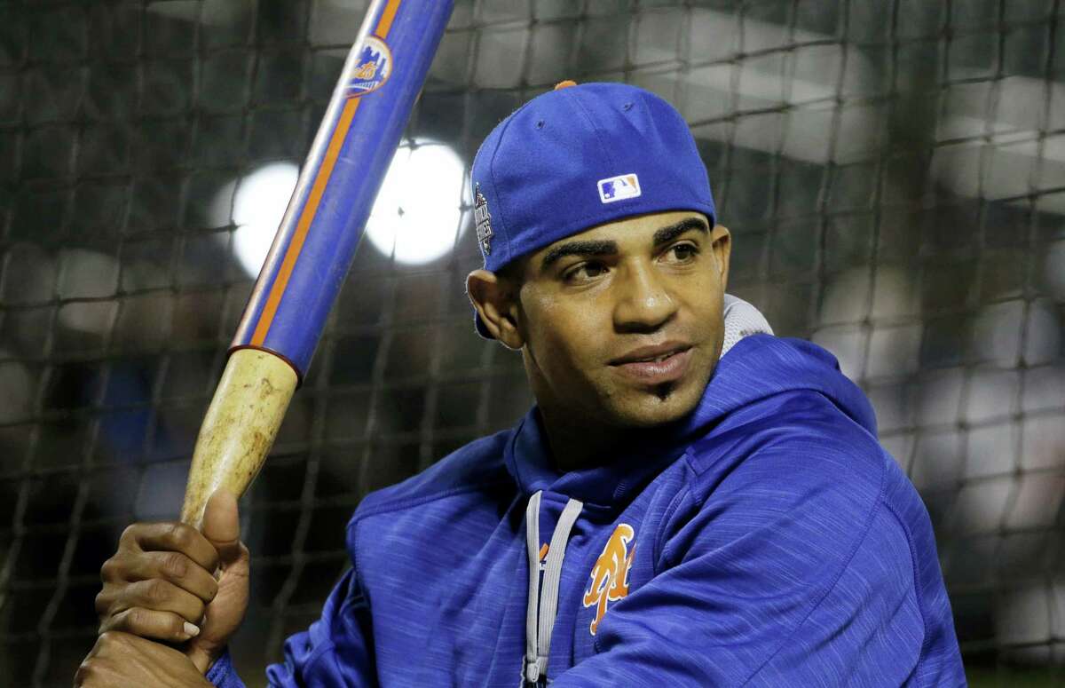 FILE - In this Nov. 1, 2015 file photo, New York Mets' Yoenis Cespedes hits before Game 5 of the Major League Baseball World Series between the New York Mets and Kansas City Royals in New York. A person familiar with the deal says free agent outfielder Yoenis Cespedes and the New York Mets have reached agreement on a three-year deal for $75 million, Friday, Jan 22, 2016. (AP Photo/David J. Phillip)