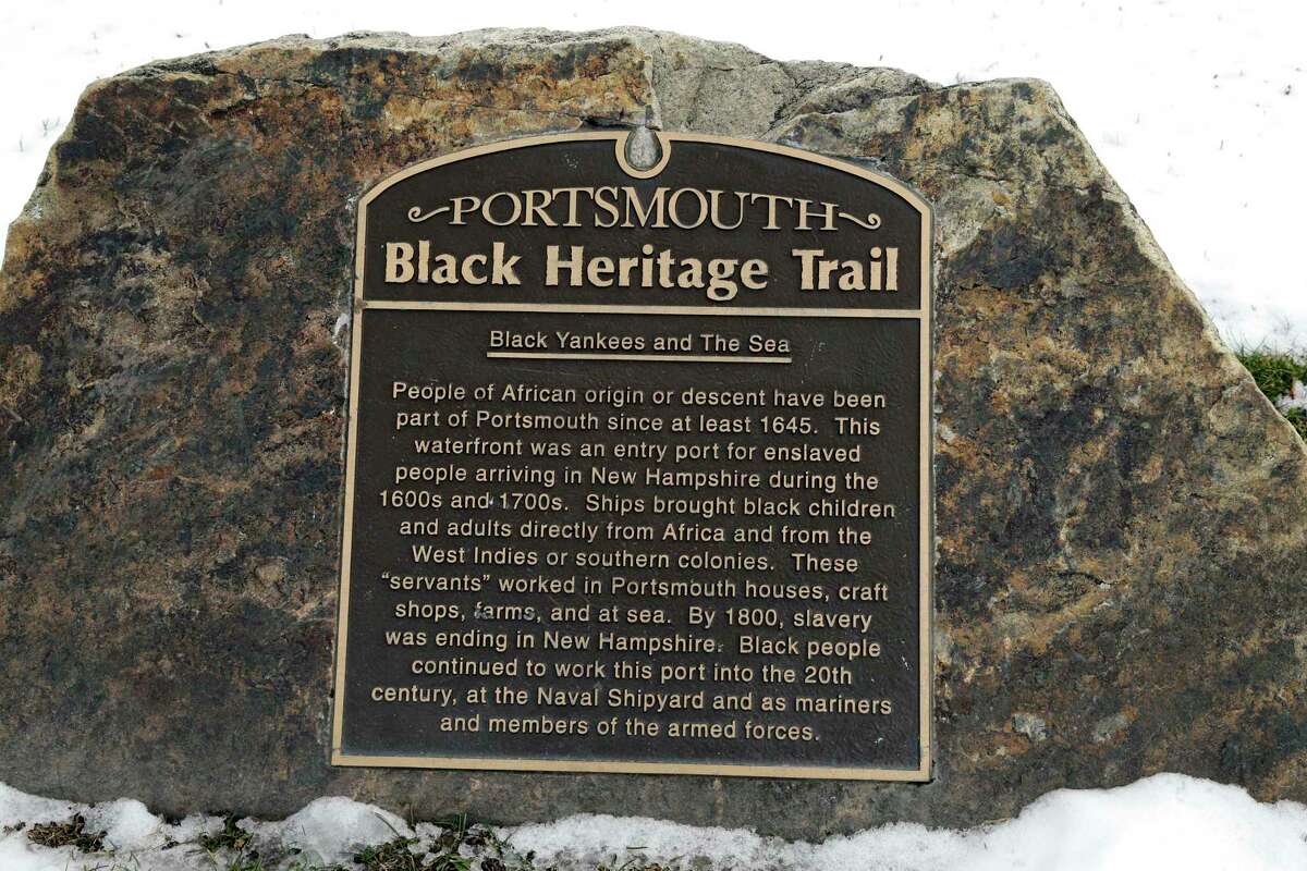 In this Jan. 26, 2016 photo, a slavery port marker sits along the shore in Portsmouth, N.H., identifying a port where slaves arrived or where ships were sent to be used in the trade. A project aimed at bringing the little-known history of some of Americaís most prolific slave-trade ports to the public is moving to its next target: Rhode Island, where some 1,000 slave-trading voyages were launched.