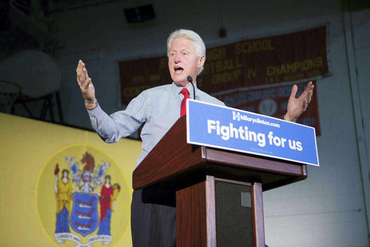 Bill Clinton campaigns for his wife, Hillary Clinton, at Edison High School on Friday.