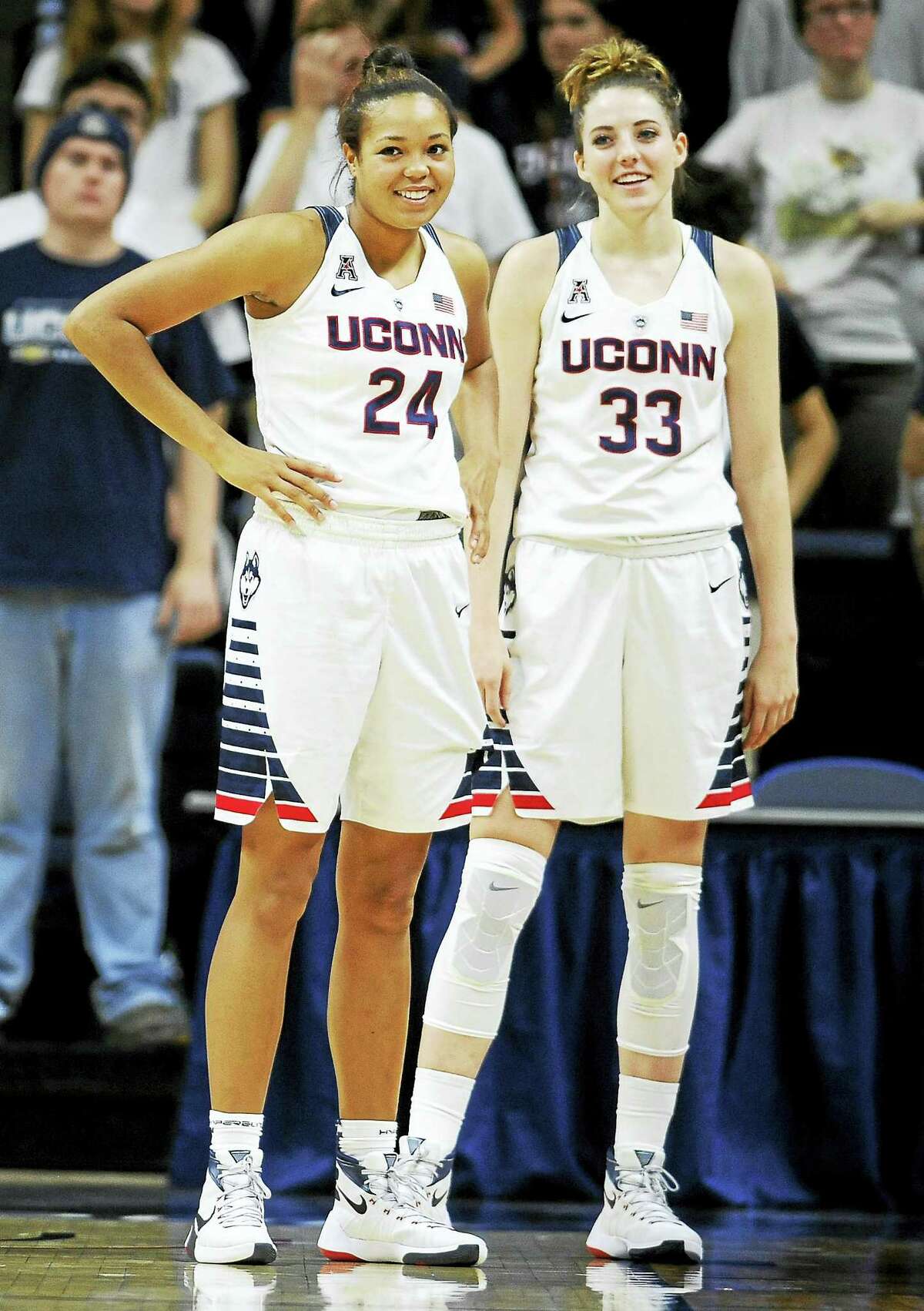 UConn’s Napheesa Collier, left, and Katie Lou Samuelson stand together during a game earlier this season.