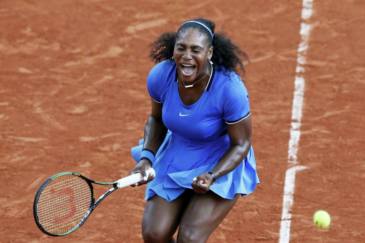 Serena Williams clenches her fist in the third set of her match against Kristina Mladenovic at the French Open on Saturday.