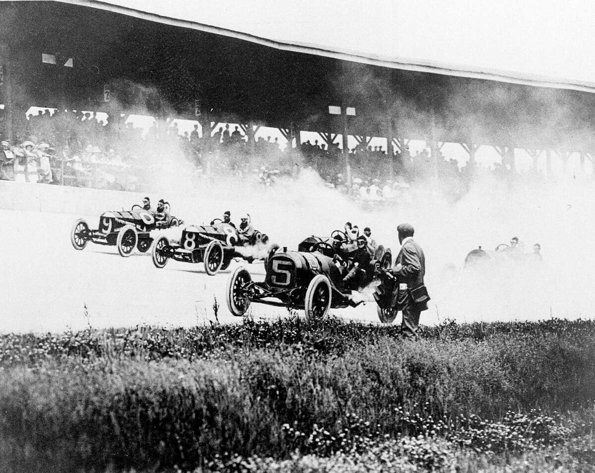 In this 1911 photo, drivers Will Jones (9), Joe Jagersberger (8) and Louis Disbrow (5) race in the first Indianapolis 500.