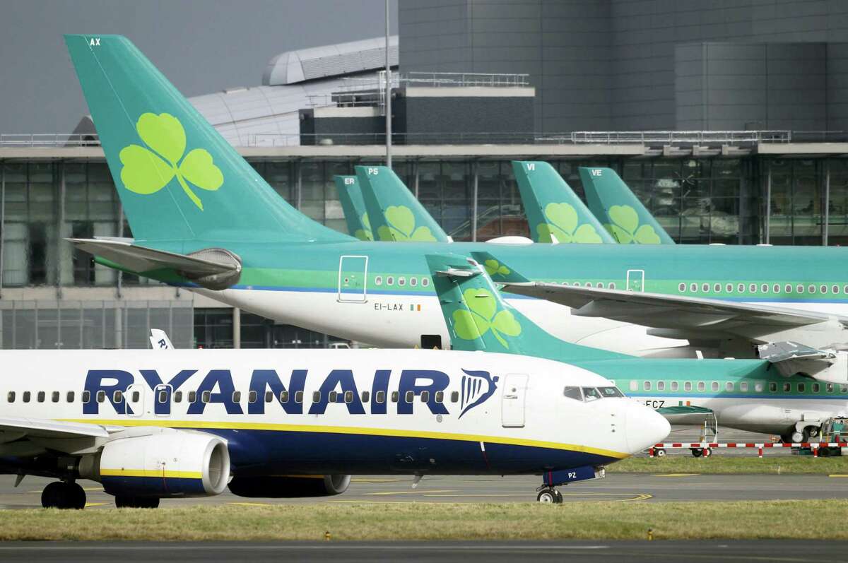 A Jan. 27, 2015 photo shows Aer Lingus planes standing on the tarmac with a Ryanair plane at Dublin airport, Ireland.