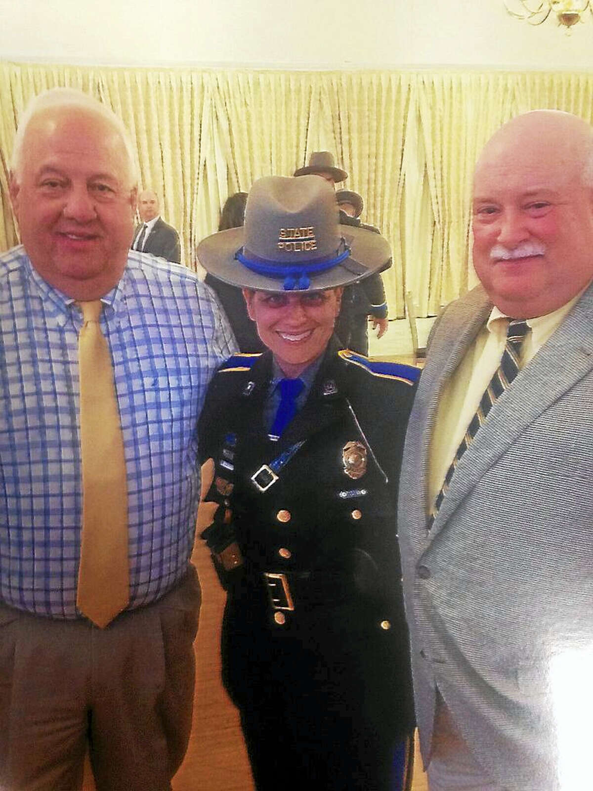 From left are Deep River First Selectman Richard H. Smith, Resident State Trooper Dawn Taylor and Constable Pete Lewis.