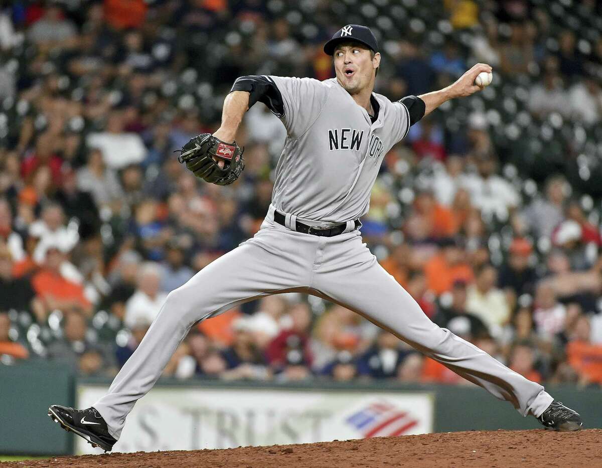 New York Yankees relief pitcher Andrew Miller delivers in the ninth inning against the Houston Astros Tuesday in Houston. The Yankees won 6-3.