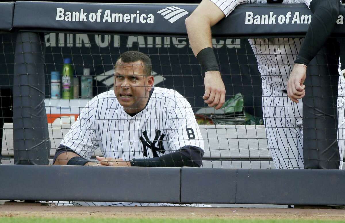 Yankees designated hitter Alex Rodriguez watches from the dugout during the eighth inning on Thursday.