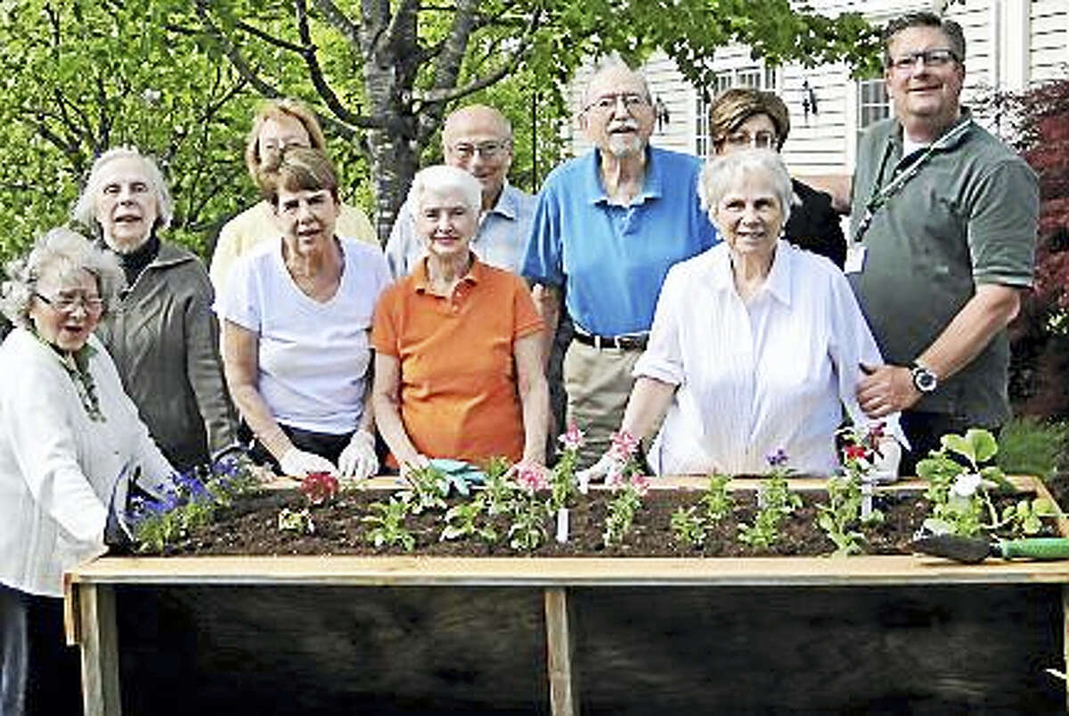 Jeff Eleveld the Plant Guy is shown with one of his raised beds that are table height. He’ll be giving a presentation at the Deep River library. His therapeutic horticulture brings people together,