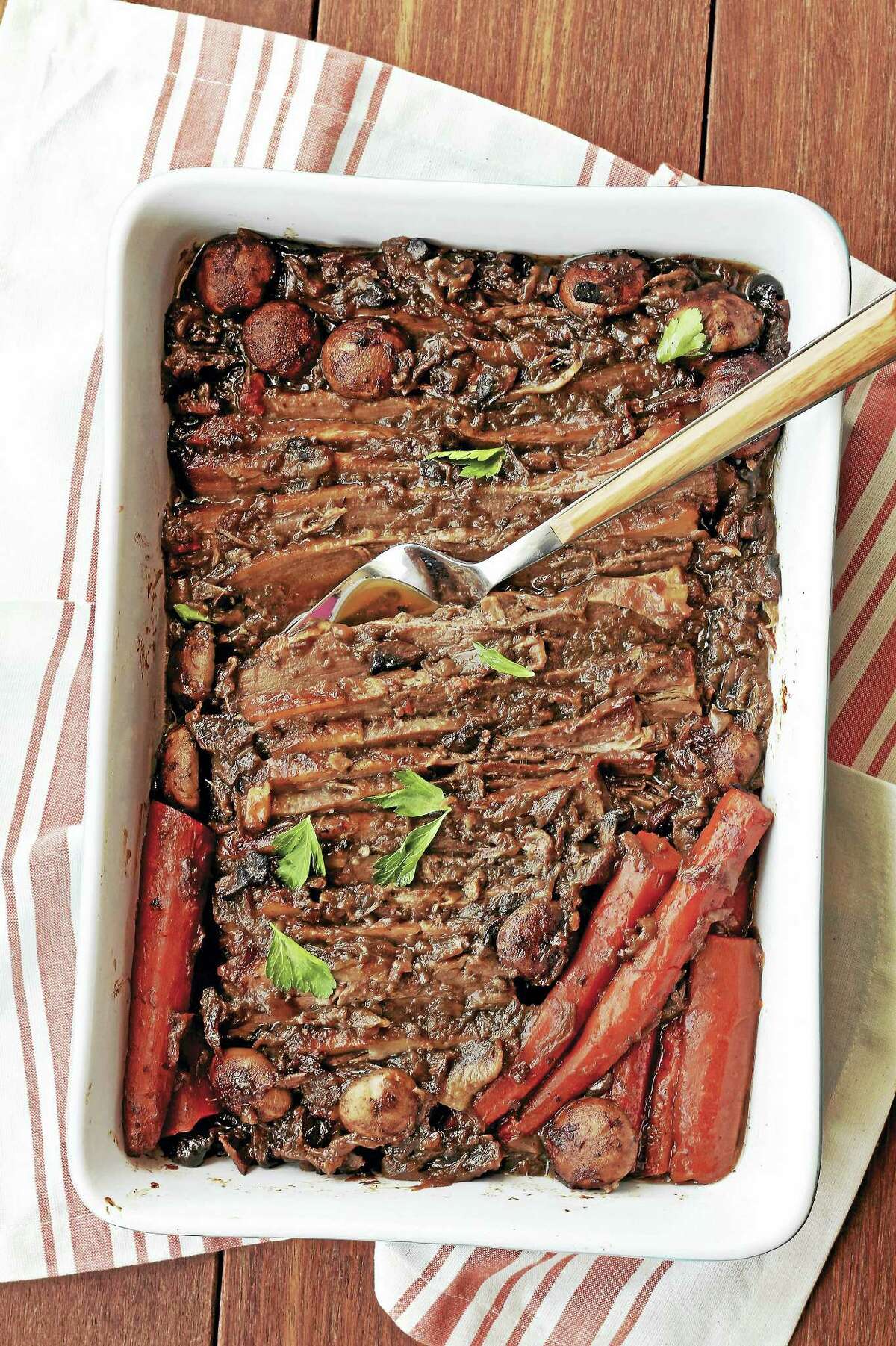 Brisket with onions and porcini mushrooms is a traditional Jewish holiday dish.