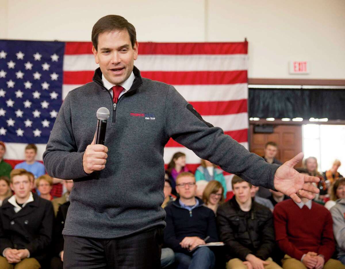 In this Jan. 23, 2016 photo, Republican presidential candidate Sen. Marco Rubio, R-Fla., speaks at the Iowa State University Alumni Center in Ames, Iowa. Trashing President Barack Obama and arguing that he has failed to spend enough on defense has become a staple for Republican presidential hopefuls.