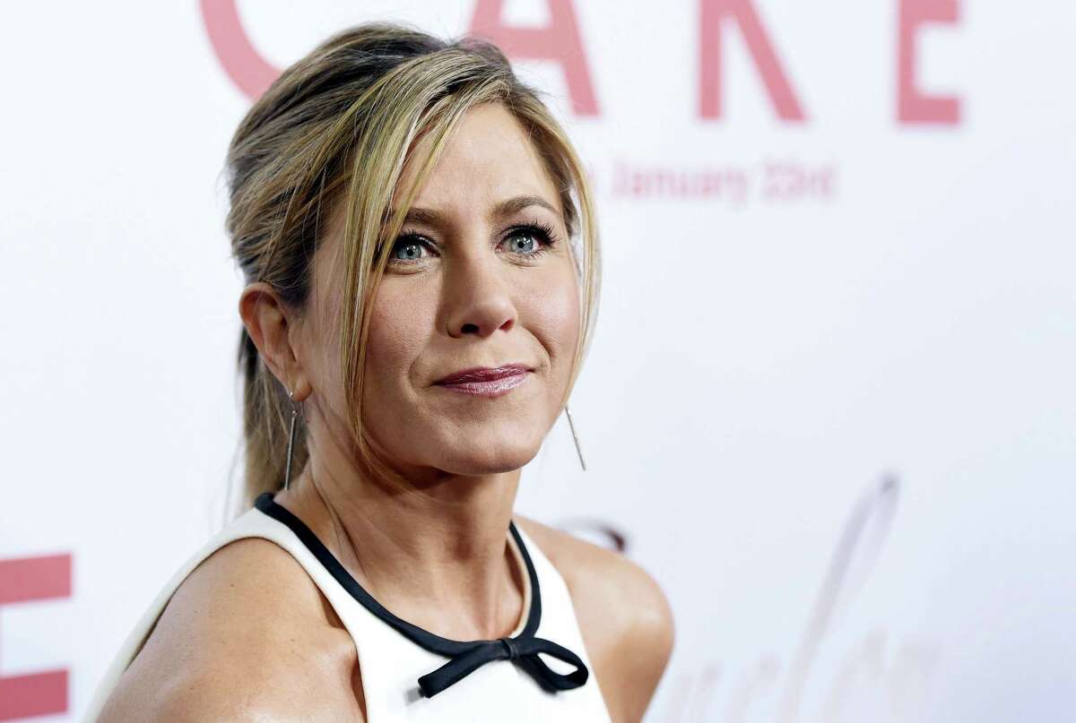 In this Jan. 14, 2015, file photo, Jennifer Aniston, a cast member in “Cake,” poses at the premiere of the film at Arclight Cinemas in Los Angeles. Aniston announced the death of her mother, Nancy Dow, in a statement to People magazine on May 25, 2016.