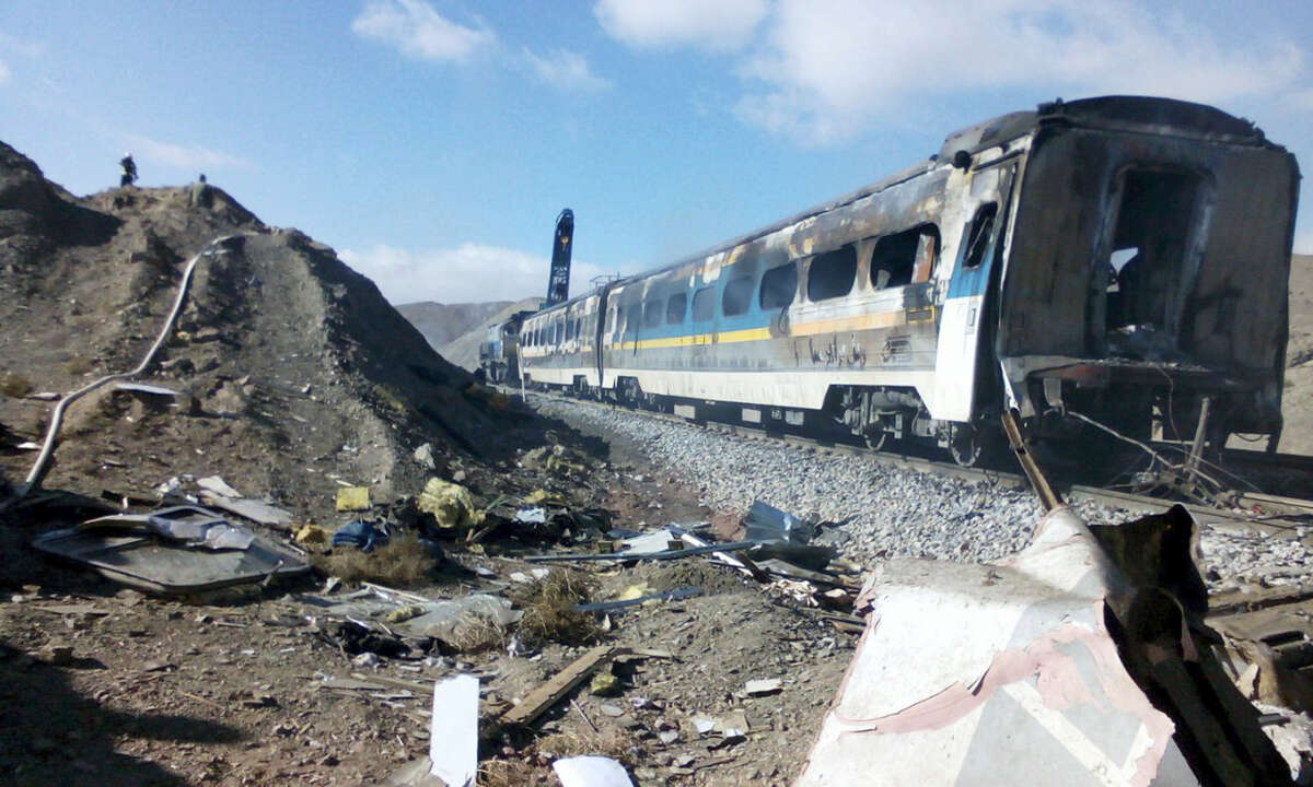 This picture released by Iranian Fars News Agency shows the scene of two trains collision about 150 miles (250 kilometers) east of the capital Tehran, Iran, Friday, Nov. 25, 2016. An Iranian official has told state TV that the death toll from a train collision in the country’s north has increased to 31. The provincial governor, Mohammad Reza Khabbaz, says that so far 31 bodies have been found at the site of the crash on Friday morning.