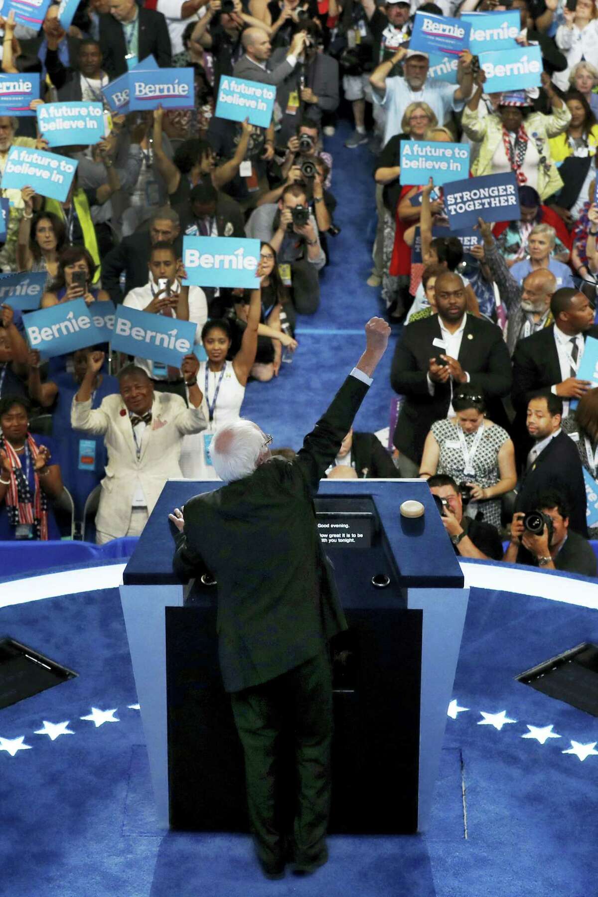 Former Democratic presidential candidate, Sen. Bernie Sanders, I-Vt., pumps his fist in the air as he addresses the first day of the Democratic National Convention in Philadelphia , Monday, July 25, 2016.