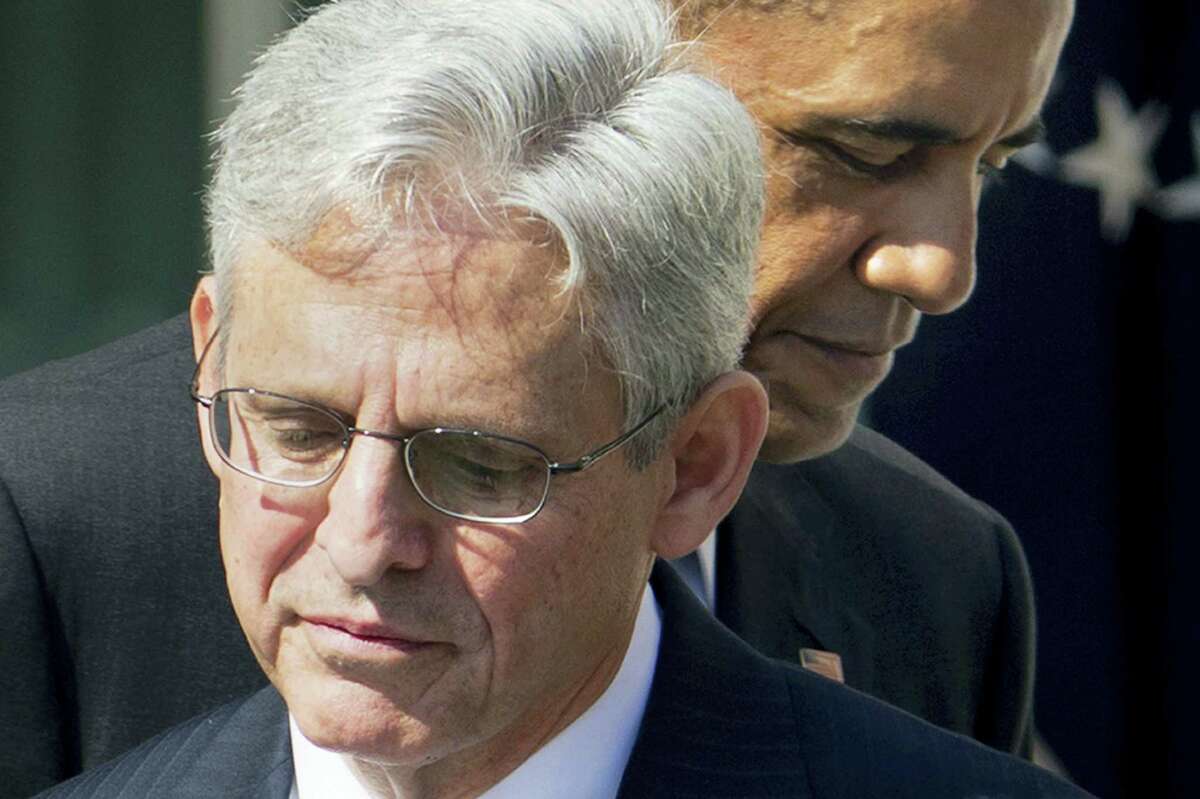 Federal appeals court Judge Merrick Garland, with President Barack Obama as he is introduced as Obama’s nominee for the Supreme Court during an announcement in the Rose Garden of the White House in Washington March 16.