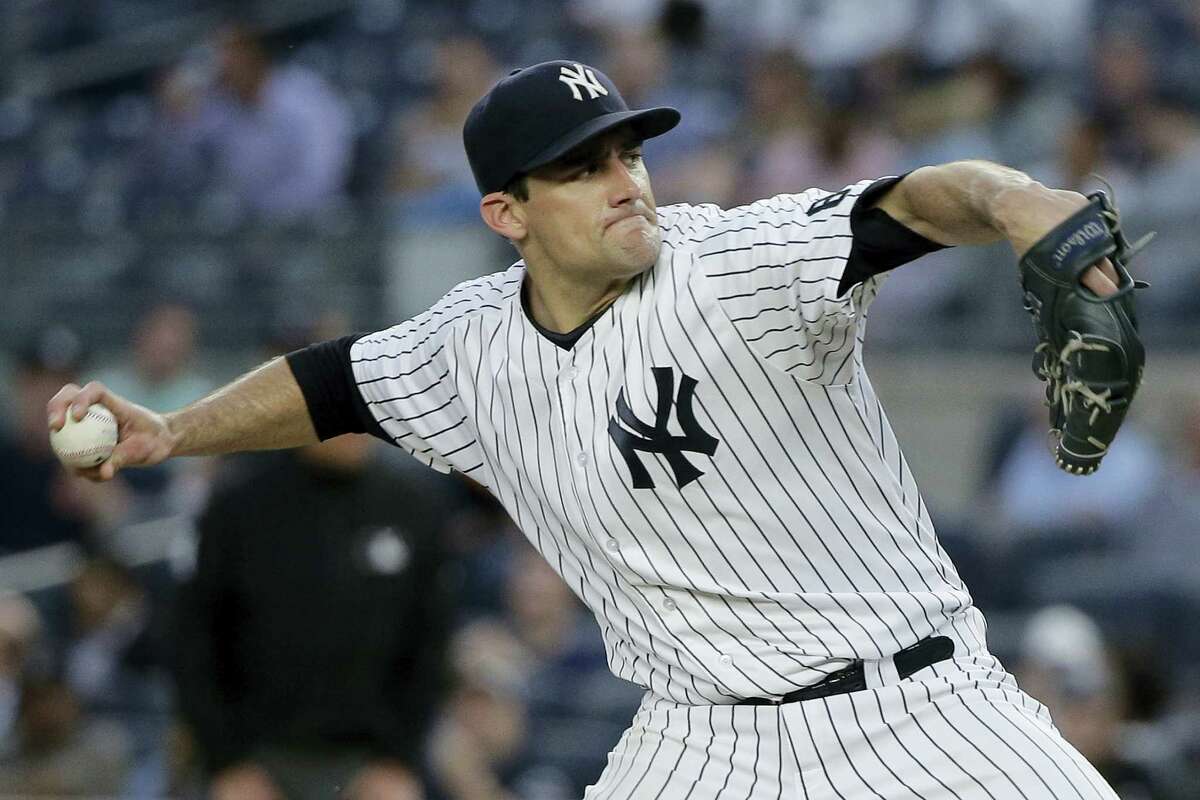 JULIE JACOBSON - THE ASSOCIATED PRESS New York Yankees pitcher Nathan Eovaldi delivers against the Toronto Blue Jays during the first inning Tuesday.