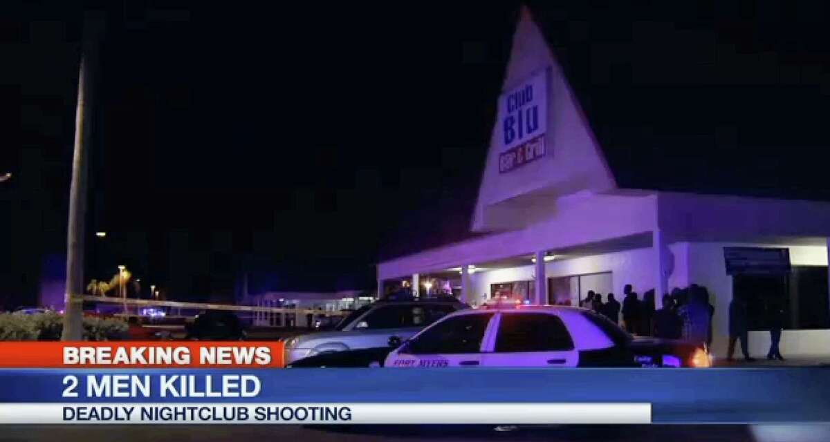 In this frame from video, people gather near the scene of a fatal shooting at Club Blu nightclub in Fort Myers, Fla. on July 25, 2016.