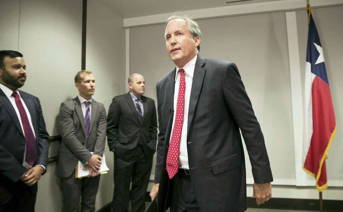 Republican Texas Attorney General Ken Paxton walks away after announcing Texas’ lawsuit to challenge President Obama’s transgender bathroom order during a news conference in Austin, Texas, Wednesday May 25, 2016. Texas and several other states are suing the Obama administration over its directive to U.S. public schools to let transgender students use the bathrooms and locker rooms that match their gender identity.