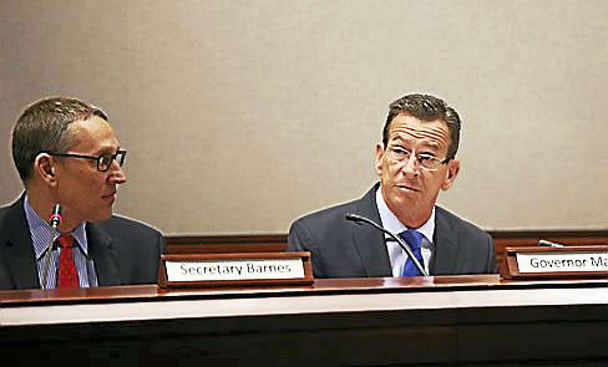 Gov. Dannel P. Malloy chairs the state Bond Commission meeting Thursday.