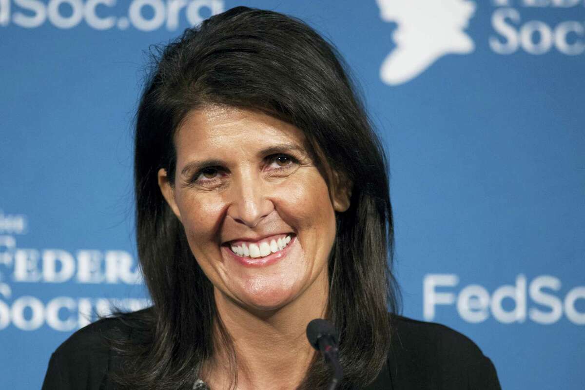 In this Nov. 18, 2016 photo, South Carolina Gov. Nikki Haley smiles while speaking at the Federalist Society’s National Lawyers Convention in Washington. President-elect Donald Trump has chosen Haley as U.S. ambassador to the United Nations, and he will treat the ambassadorship as a Cabinet-level position, according to two sources familiar with Trump’s decision who requested anonymity to discuss the decision and its announcement.