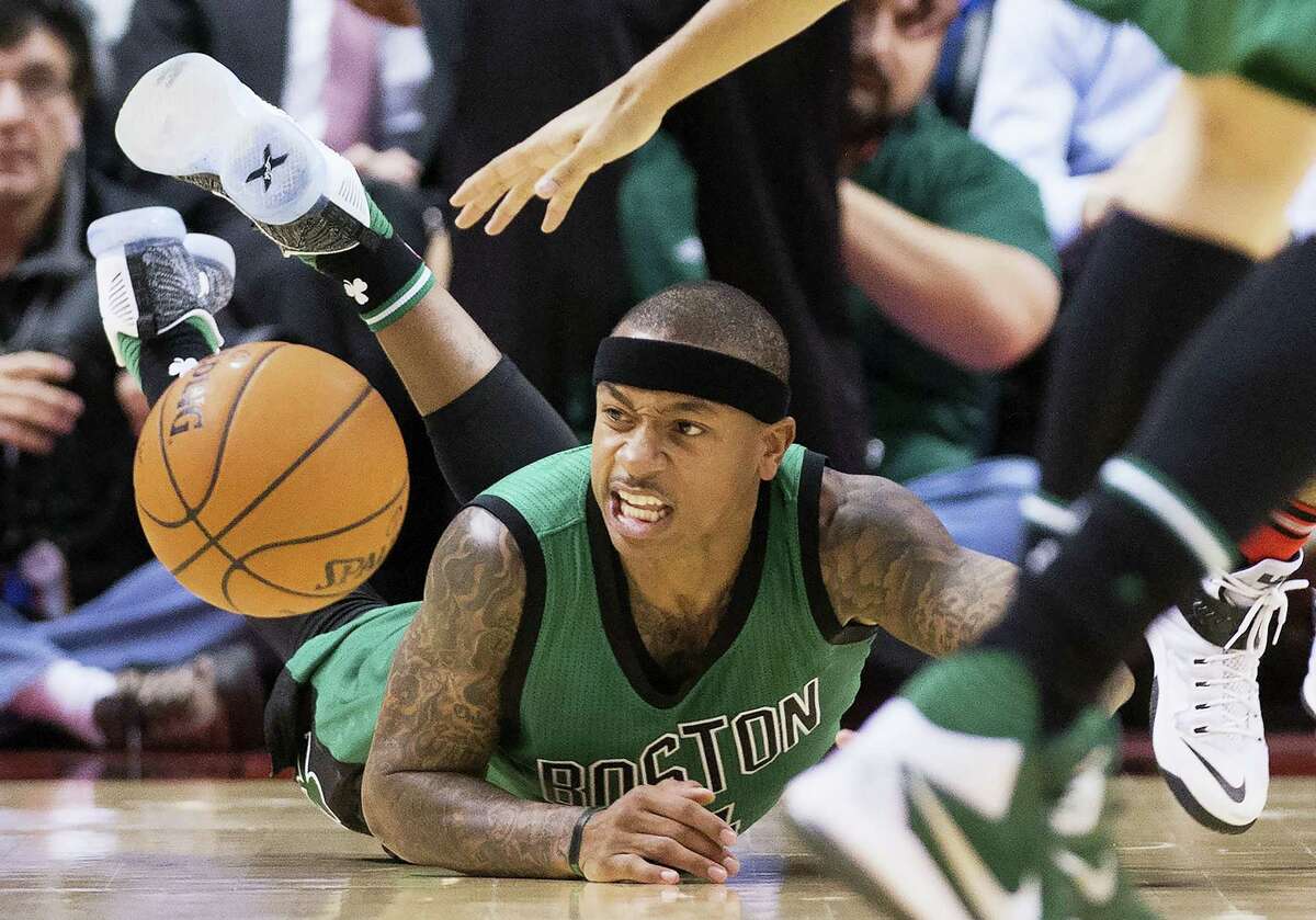 Boston Celtics guard Isaiah Thomas eyes a loose ball during the second half of an NBA basketball game against the Toronto Raptors in Toronto on Wednesday, Jan. 20, 2016. (Nathan Denette/The Canadian Press via AP)