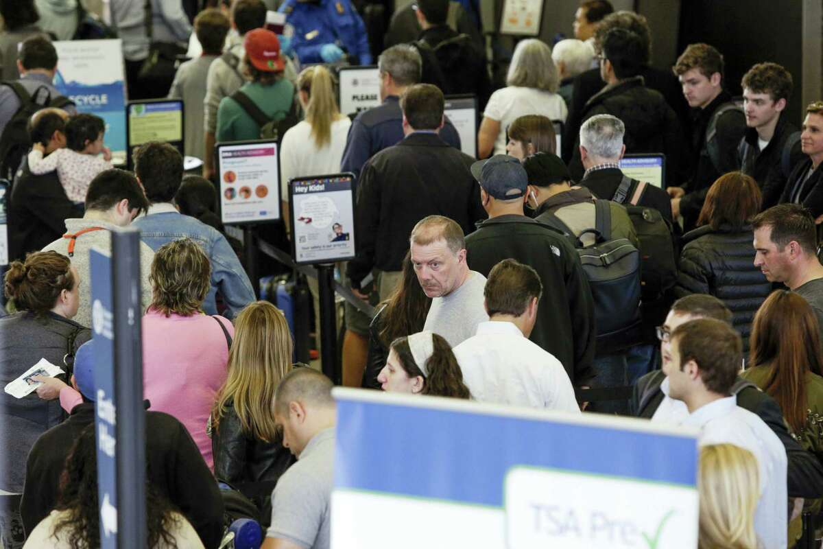 A long line of travelers at the TSA security checkpoint at O’Hare International Airport in Chicago on May 16.