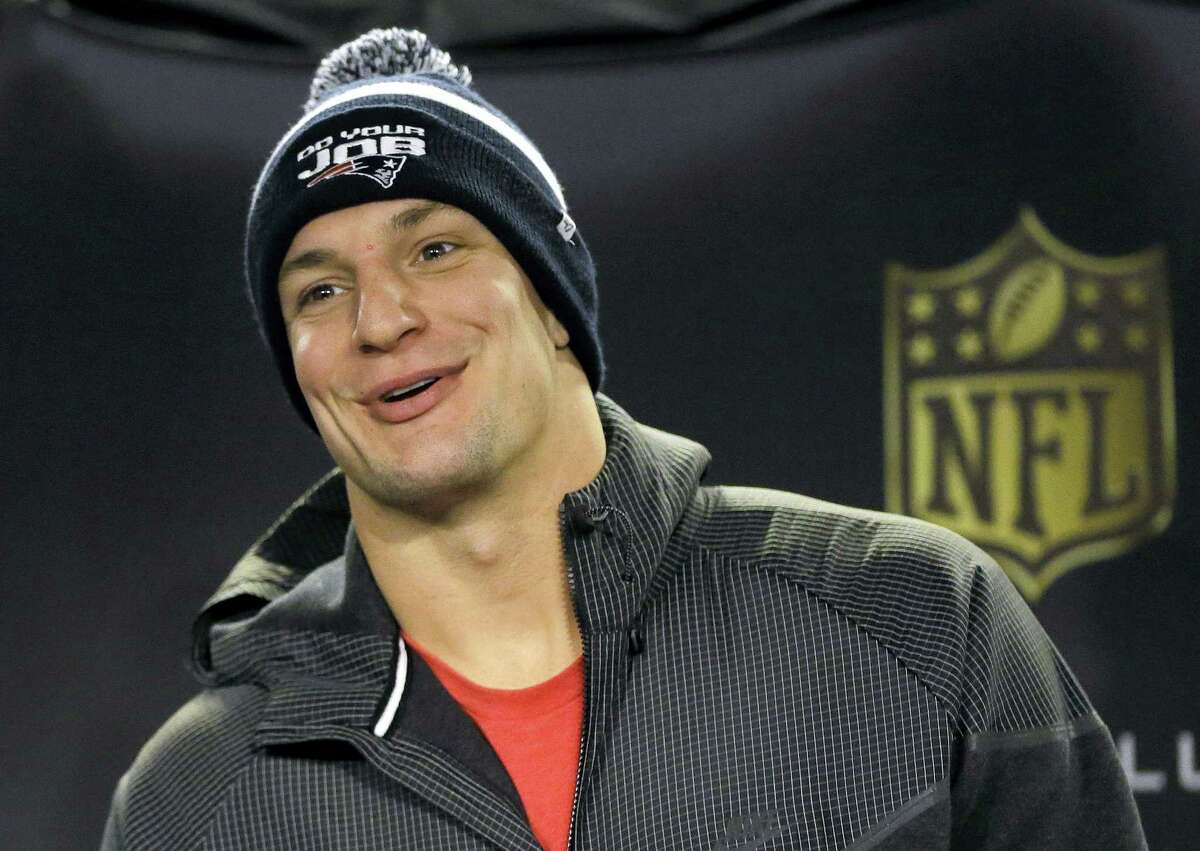 Patriots tight end Rob Gronkowski faces reporters before practice on Thursday.