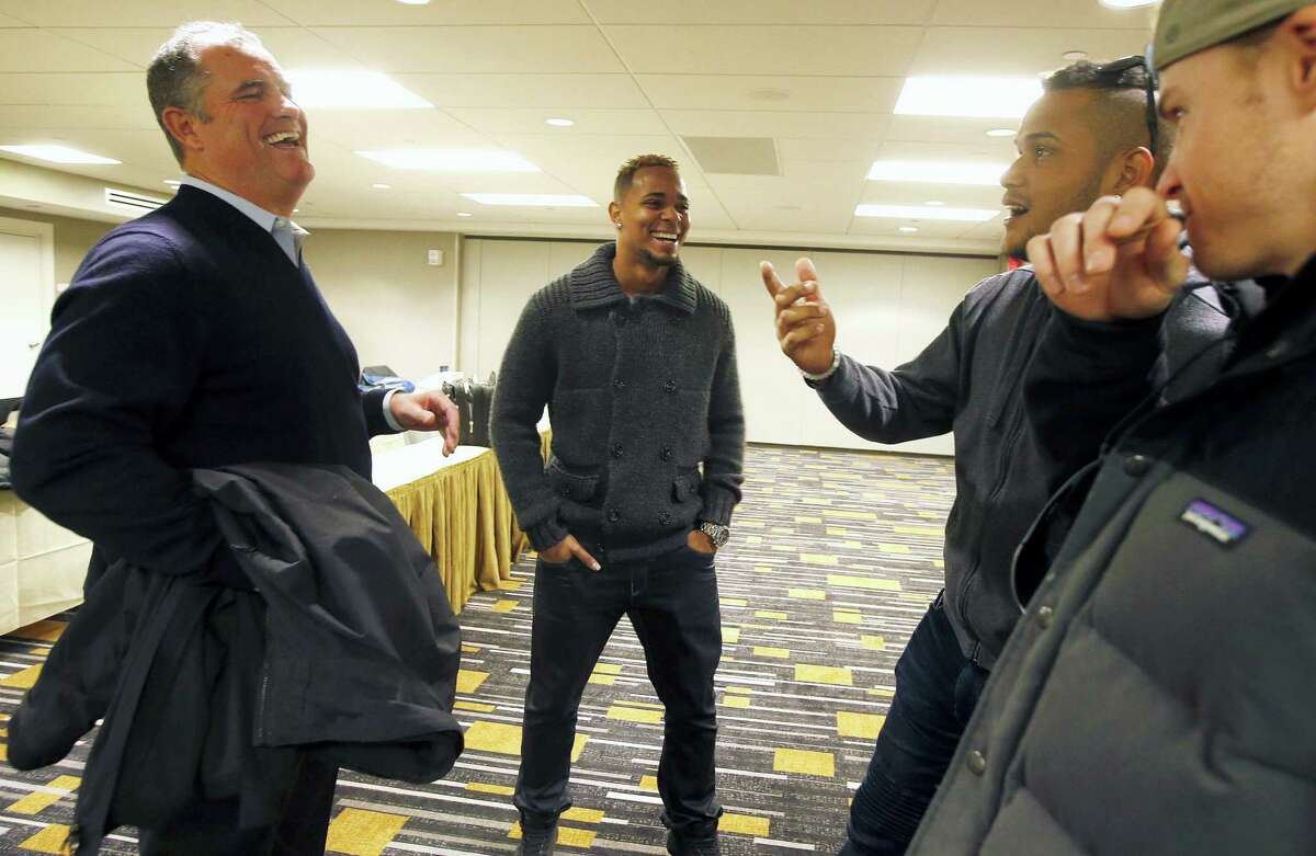 Red Sox manager John Farrell, left, jokes with players, from left, Xander Bogaerts, Eduardo Rodriguez and Brock Holt during a media availability prior to the Boston chapter of the Baseball Writers Association of America’s awards dinner Thursday in Boston.